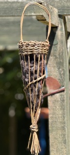 Willow nesting wool feeder with Hebridean wool